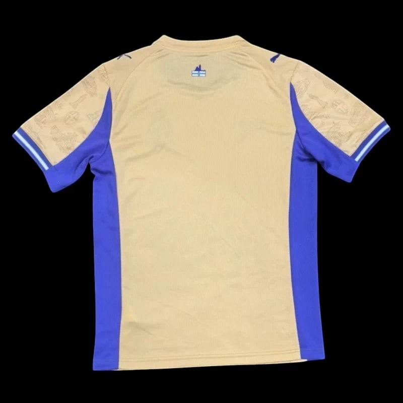 Maillot de football Olympique de Marseille doré pour homme, manches bleues avec motifs, logo Puma et sponsor CMA CGM.