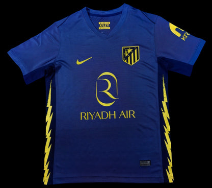 Maillot de football Atletico de Madrid bleu marine pour homme, avec logo jaune et détails éclairs sur les côtés. My Store 4