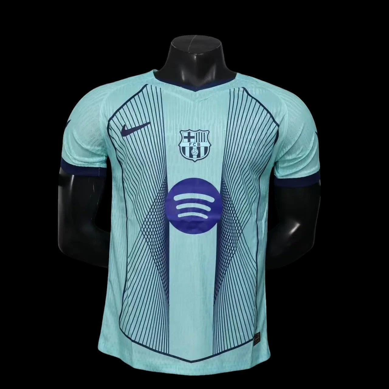 Maillot de football My Store 4 bleu sarcelle pour homme, avec logo FC Barcelone, Nike et Spotify. Lignes graphiques bleues.