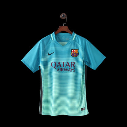 Maillot de football My Store 4 homme bleu sarcelle et vert menthe dégradé avec rayures horizontales, logo FC Barcelone et sponsor Qatar Airways.