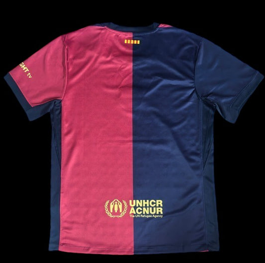 Maillot de football bicolore rouge et bleu marine My Store 4, avec logo UNHCR et détails de sponsors.