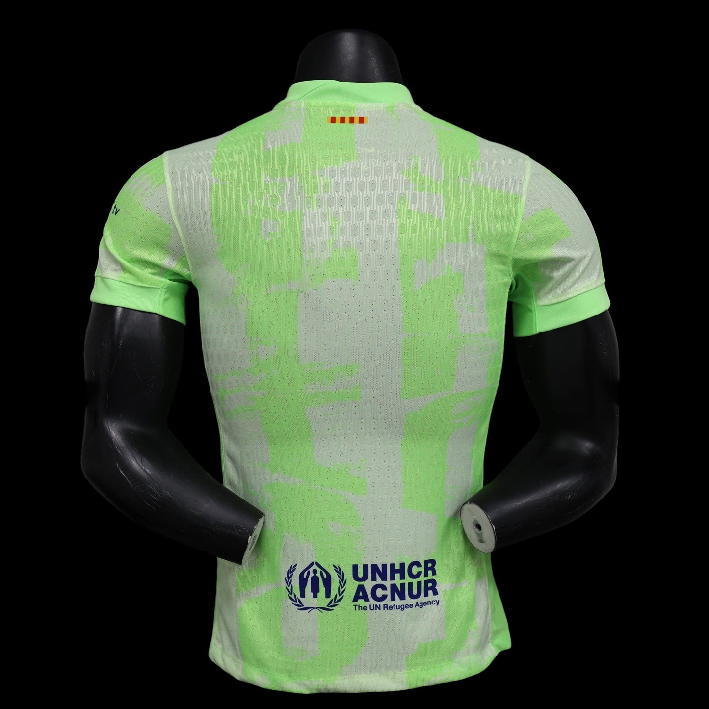 Maillot de football My Store 4 homme vert vif avec motif abstrait et logo UNHCR ACNUR. Tissu technique respirant.