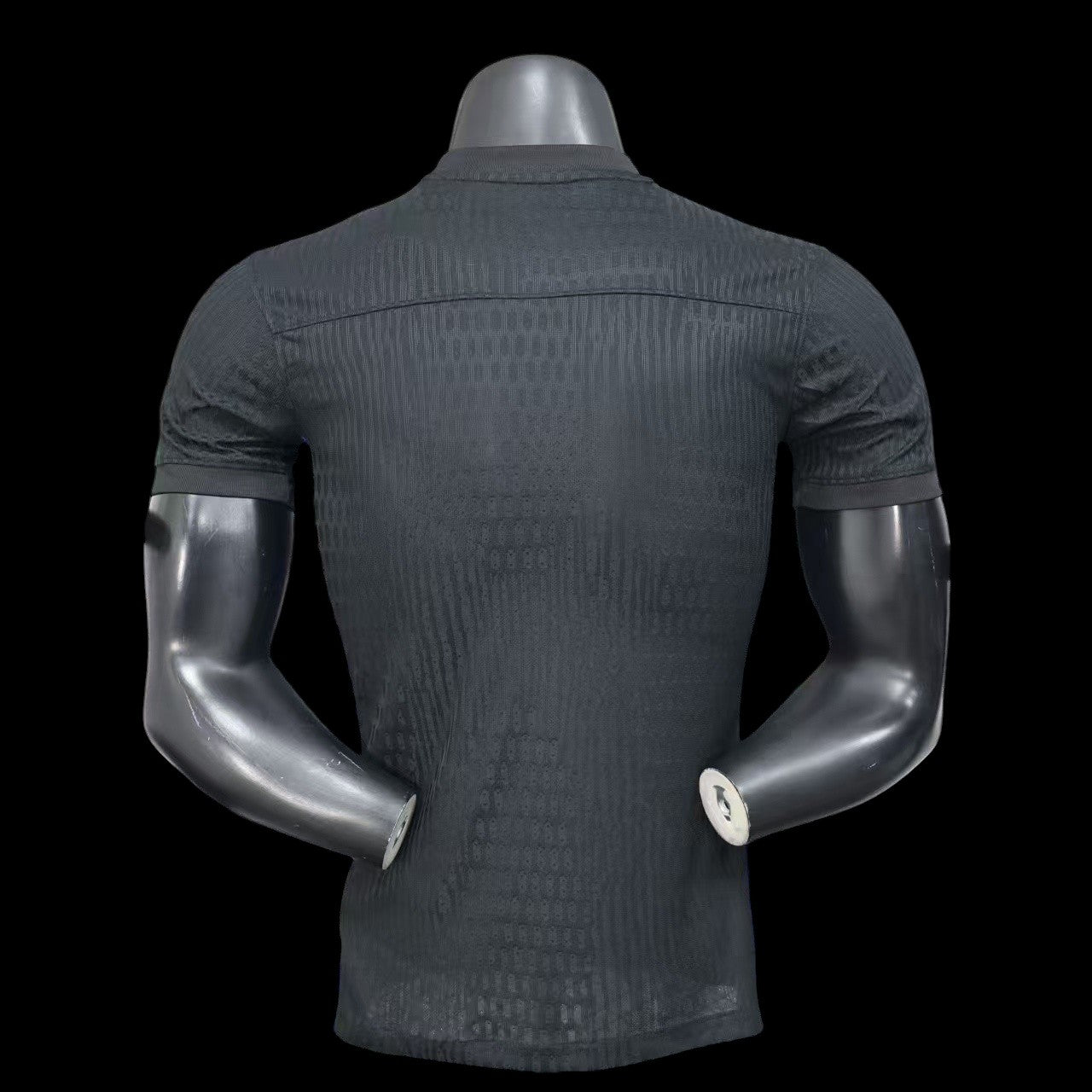 My Store 4 Maillot de football homme noir avec texture subtile et accents violets. Tissu respirant.
