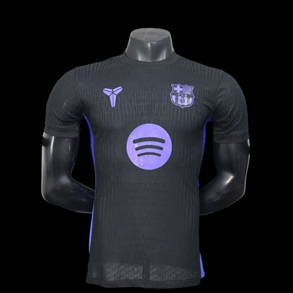 Maillot de football My Store 4 noir avec logo Spotify violet et détails texturés. Tissu respirant.