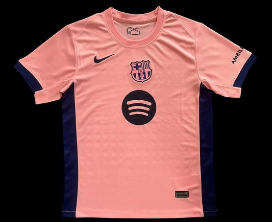 Maillot de football My Store 4 homme rose vif, détails bleu marine, logo FCB et Spotify sur la poitrine.