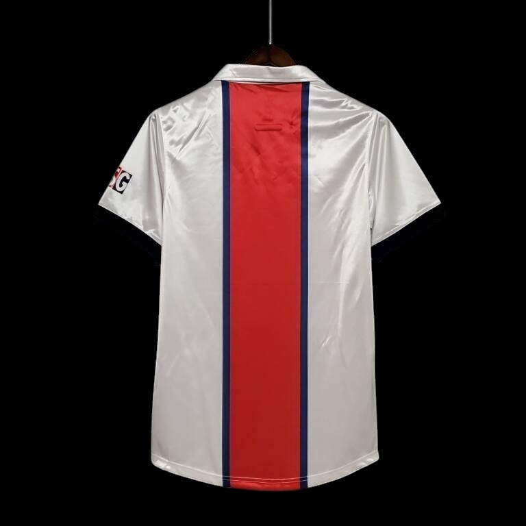 Maillot de football vintage blanc My Store 4, avec bande centrale rouge et bleue, manches courtes bleu marine, col polo.