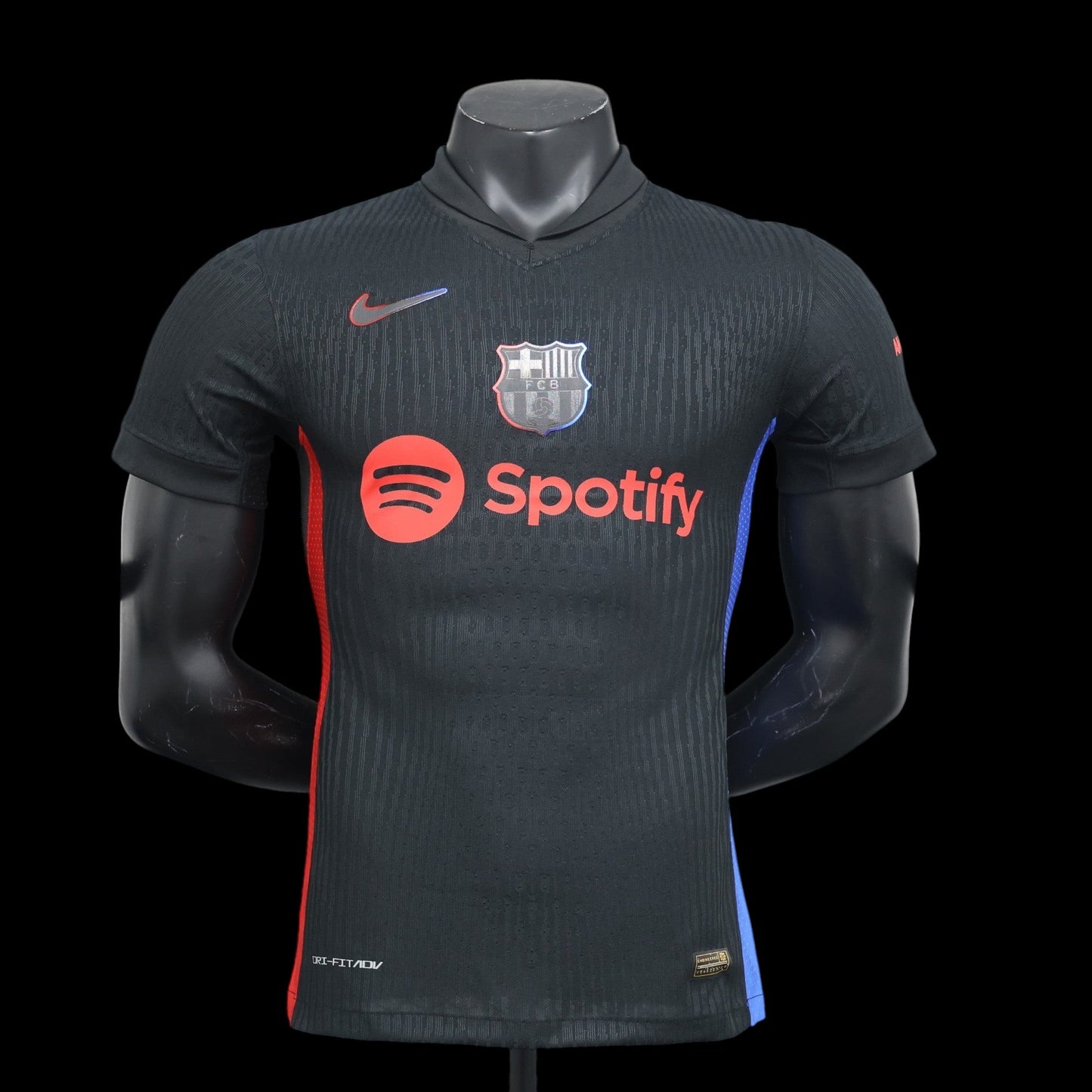 Maillot de football FC Barcelone homme noir avec logo Spotify et Nike. Tissu Dri-FIT.
