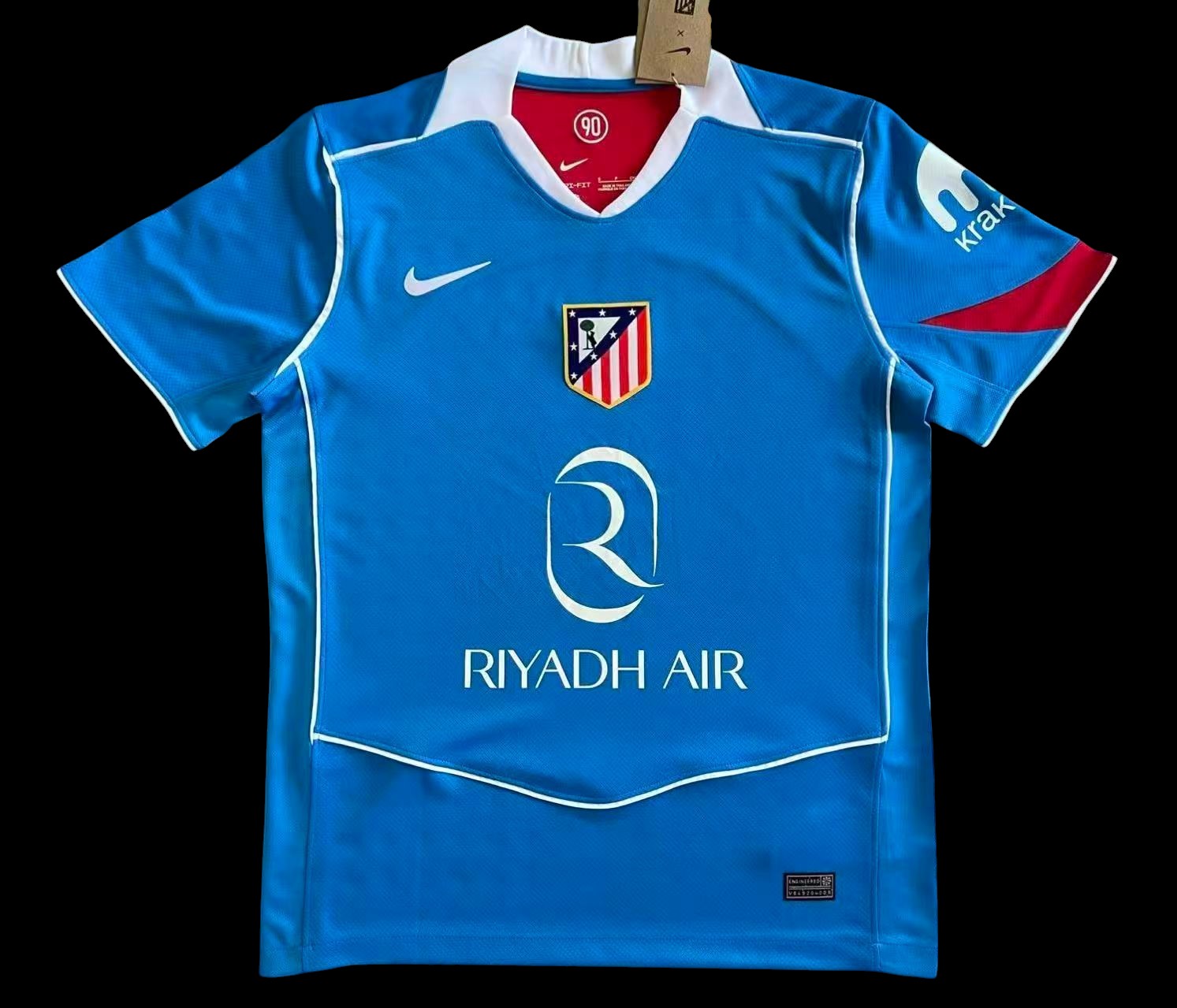Maillot de football bleu vif pour homme My Store, avec logo d'équipe, accents rouges et blancs, tissu respirant.