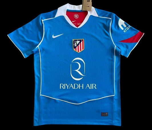 Maillot de football bleu vif pour homme My Store, avec logo d'équipe, accents rouges et blancs, tissu respirant.