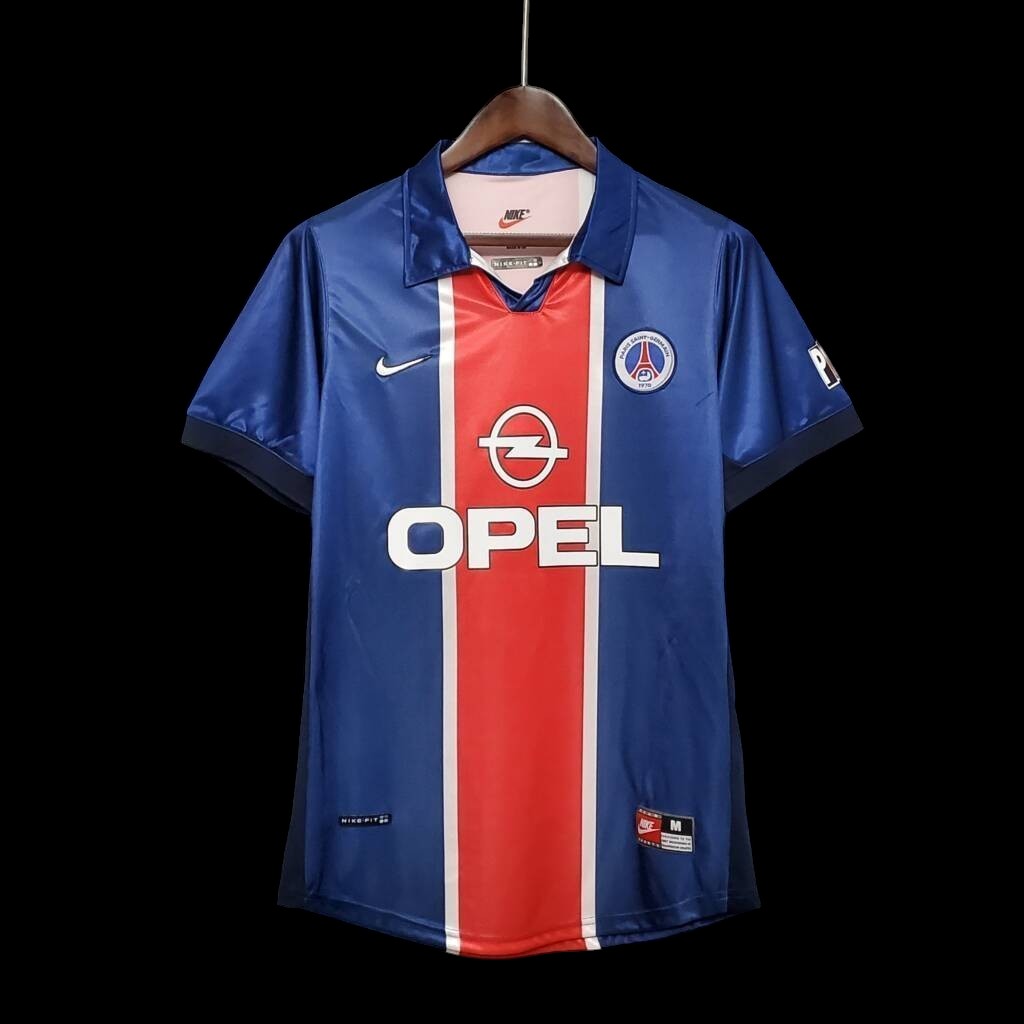 Maillot de football vintage Paris Saint-Germain bleu avec bande rouge et blanche, logo Opel et Nike. My Store