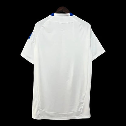 Maillot de football Olympique Lyonnais domicile blanc Adidas pour homme, avec col et bandes bleues sur les épaules. Logo OL et sponsor BetClic.