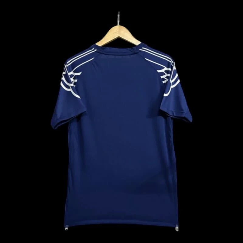 Maillot de football bleu marine pour homme My Store, inspiré du Paris Saint-Germain, avec détails blancs sur les épaules.