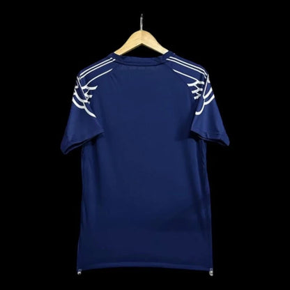 Maillot de football bleu marine pour homme My Store, inspiré du Paris Saint-Germain, avec détails blancs sur les épaules.