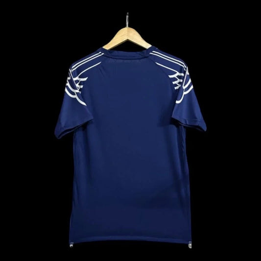 Maillot de football bleu marine pour homme My Store, inspiré du Paris Saint-Germain, avec détails blancs sur les épaules.