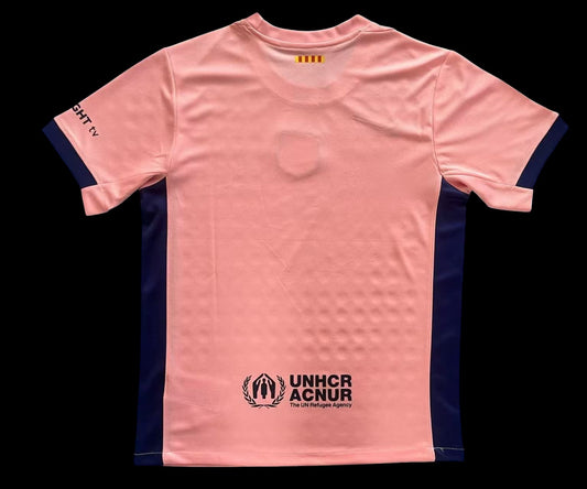 Maillot de football My Store 4 homme rose vif avec détails bleu marine, logo UNHCR ACNUR dans le dos.